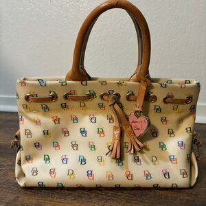 Dooney & Bourke Pale Yellow Vinyl Handbag / Purse w/ Leather Hand
Held Straps!